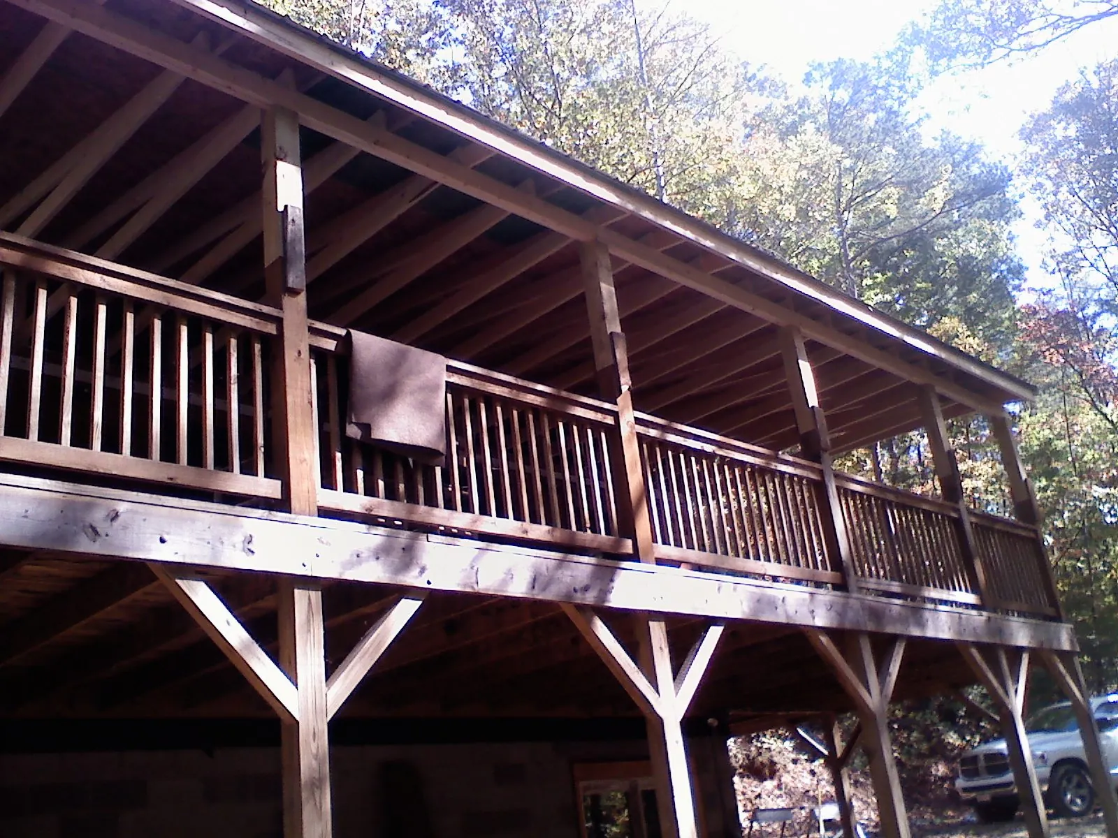 Timber framing under a new elevated porch and deck — Roof Leak Repair in Sherborn by Roofing Brothers